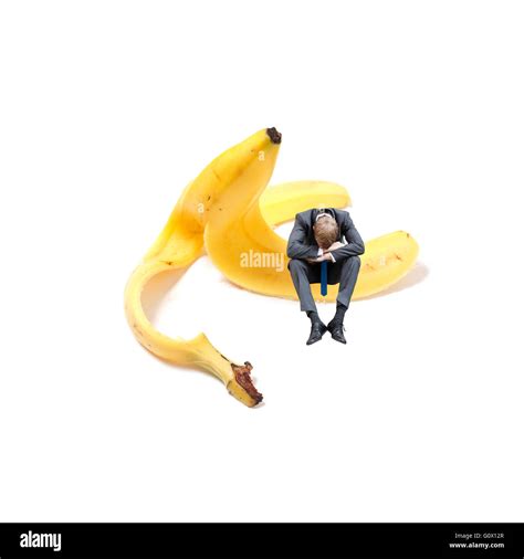 Risk slipping on banana peel Stock Photo - Alamy