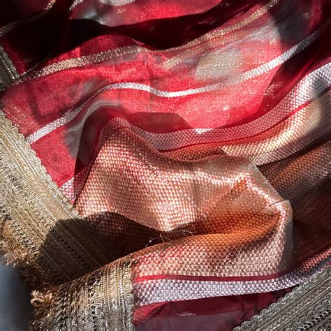 Teej special - Crimson red tissue silk striped and buti maharani saree ...