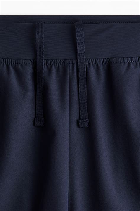 Men’s Navy blue Short sports shorts with DryMove™ | H&M IN