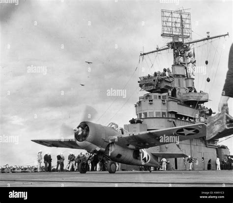 A Grumman F4F-4 Wildcat fighter taking off from USS Ranger (CV-4) to ...
