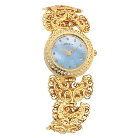 Buy Online Titan Nebula Nakashi Quartz Analog 18 Karat Solid Gold Watch ...