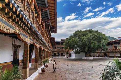 Is Bhutanese A Language? Official Language Of Bhutan - A Bus On a Dusty ...