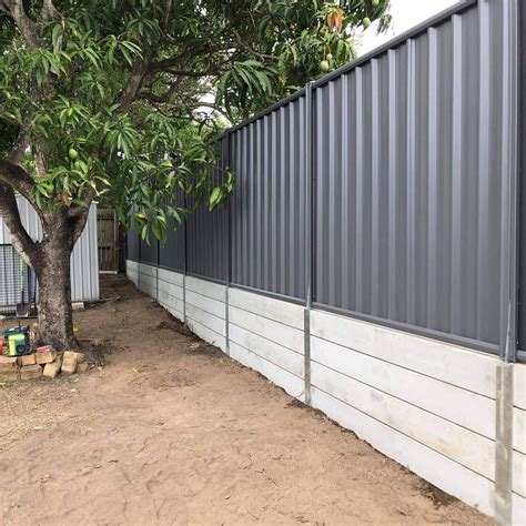 New concrete sleeper retaining wall and colorbond fence – Artofit