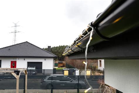 Installing Gutter Lights 的图像结果