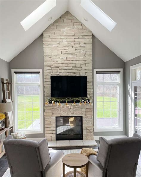Beige Dry Stack Stone Floor to Ceiling Fireplace - Soul & Lane