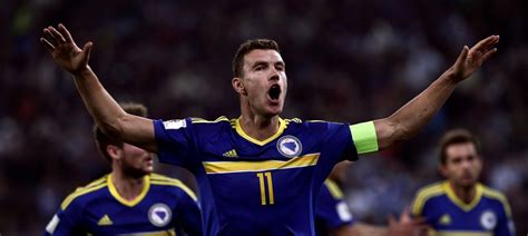 Watch: Bosnia's Edin Dzeko is shown a red card – for pulling his ...