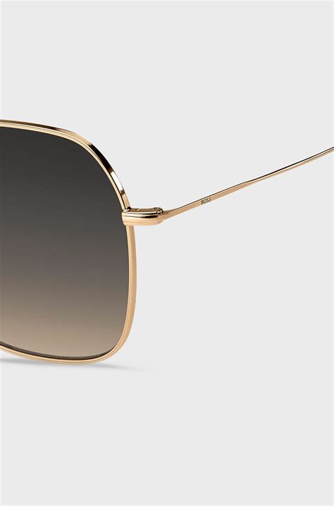 BOSS - Steel sunglasses with branded temples - Gold