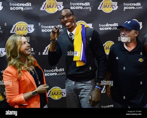 Dwight Howard (C) shows the Los Angeles Lakers 2002 NBA Finals ring ...