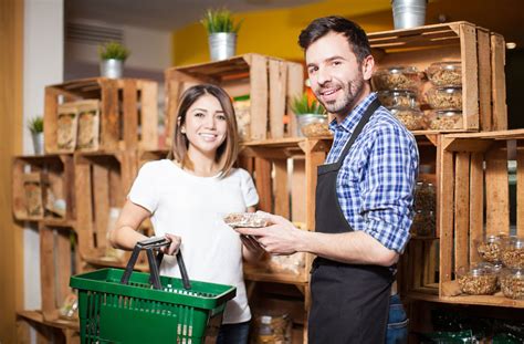 bigstock-Store-Clerk-Helping-A-Customer – C&K Market Inc