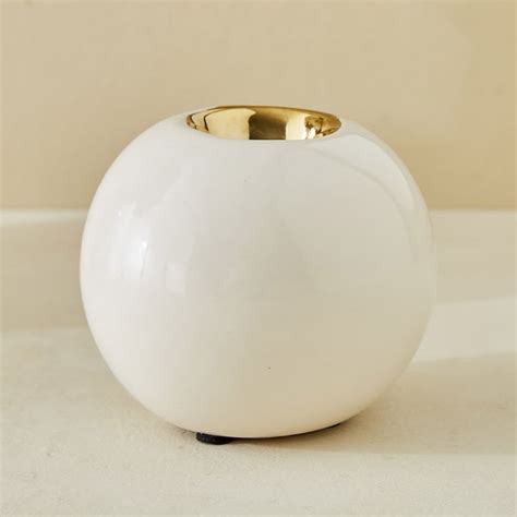 Buy Moksha Ceramic Waves T-Light Holder from Home Centre at just INR 499.0