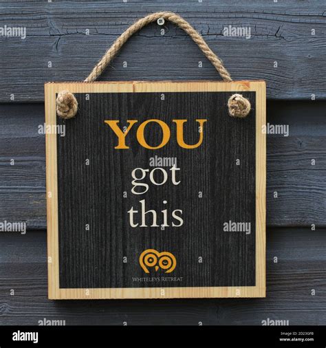 Motivational statements printed onto old wooden floorboard for coastes ...