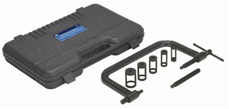 Image result for OTC Clamshell Spring Compressor