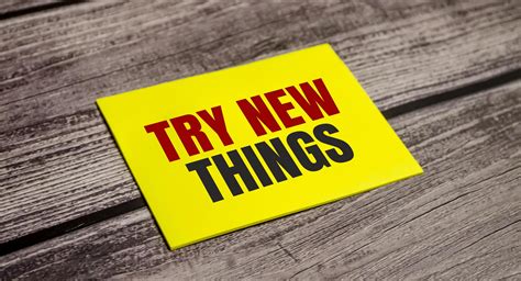 In the yellow sticker the text concept word TRY NEW THINGS 12847454 ...