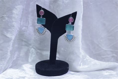 Ice blue and pale pink ear rings – Deepthi Ganesh