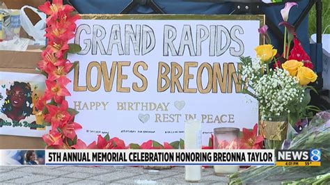 People gather at Breonna Taylors make shift memorial in Injustice Square Park in downtown Louisville