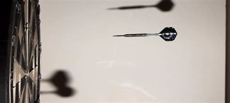 Why the dartboard looks like it does, and how bad players can do better