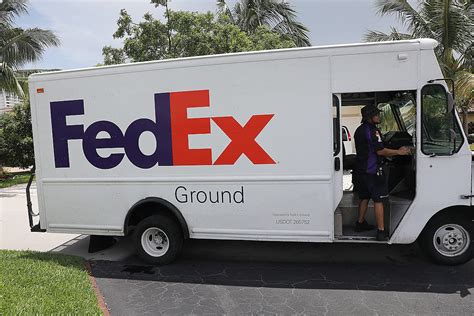 FedEx workers race to meet record demand