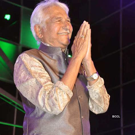 Actor Ramesh Dev greets the audience during Shiv Gaurav Awards 2013 ...