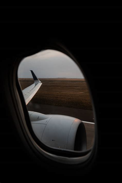 Download Plane Window Seat Wallpaper | Wallpapers.com