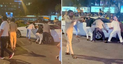 Jaguar XJ luxury sedan gets stuck on speed breaker [Video]