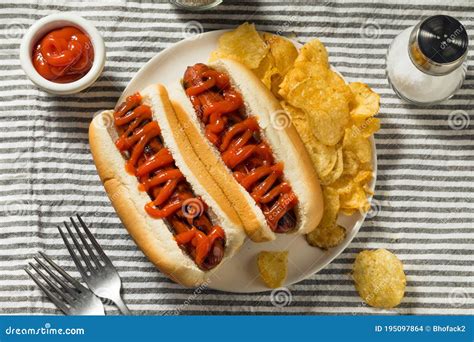 American Hot Dog with Ketchup Stock Photo - Image of fatty, tomato ...