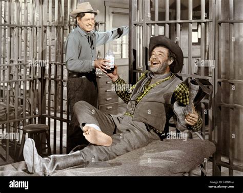 THE BOY FROM OKLAHOMA, from left: Will Rogers Jr., Lon Chaney Jr., 1954 ...