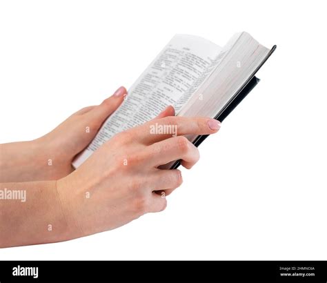 Hands holding book hi-res stock photography and images - Alamy