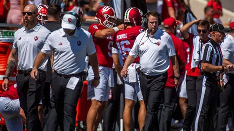 How far did Indiana football drop in Coaches Poll Top 25?