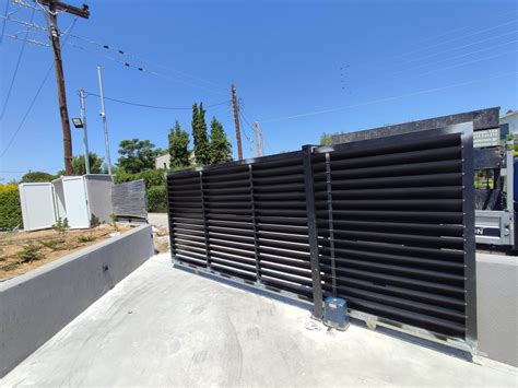 Sliding gate mechanisms - LoweDoors
