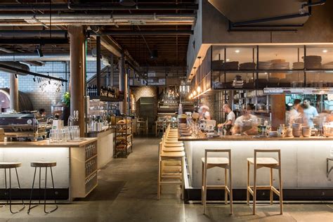 An open kitchen in the middle of the restaurant takes centre stage ...