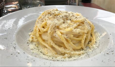 Spaghetti with Cacio e Pepe: Cheese and Pepper - An Italian dish