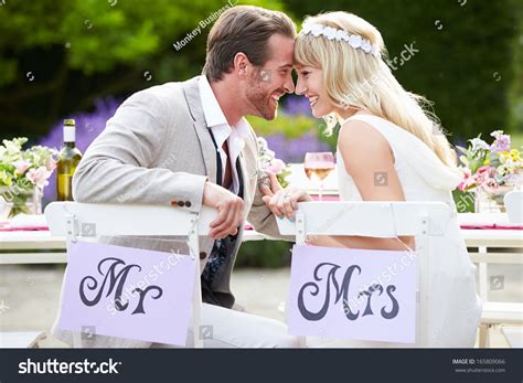 Image result for Wedding Bride and Groom Sitting in Reception