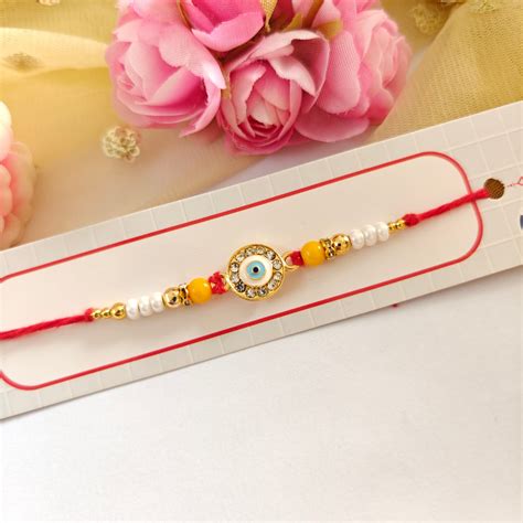 RAKHI - Nazar Battu (Evil Eye) Metal Charm Set of 1 (RK015) – Kalakariatoz