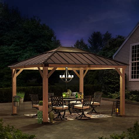 Sunjoy Brown 11 ft. x 13 ft. Patio Cedar Framed Polycarbonate Hip Roof ...