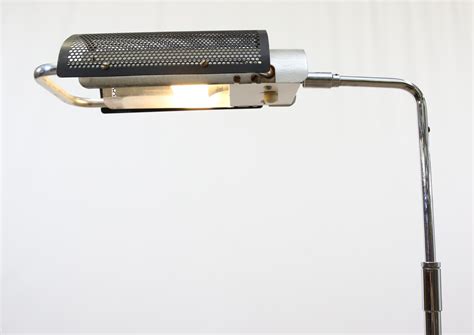 George Nelson | Floor lamp with a perforated shade | MutualArt