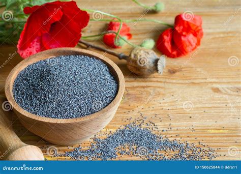 Poppy Seed and Flowers on the Table Stock Photo - Image of green ...