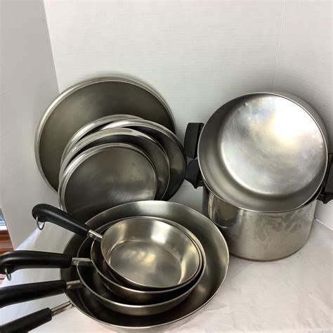 738 Lot of Vintage Revere Ware Pots, Skillets, and Lids | EstateSales.org