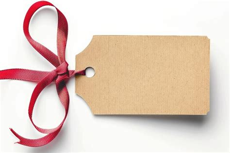 Plain blank gift tag or manila label with ribbon isolated on white ...