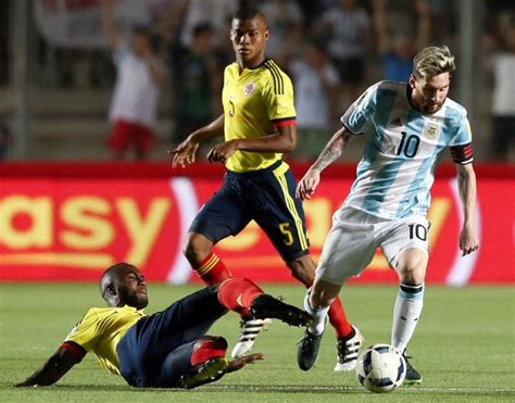 PHOTOS: Messi magic puts Argentina back on World Cup track - Rediff Sports