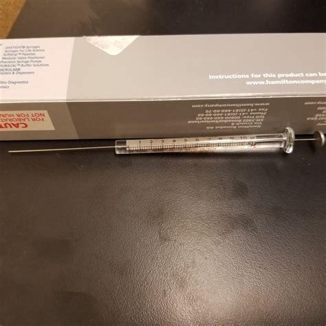 This glass syringe used to accurately dispense 1-10 ul of liquid (1ul is 1/1000 of a milliliter ...