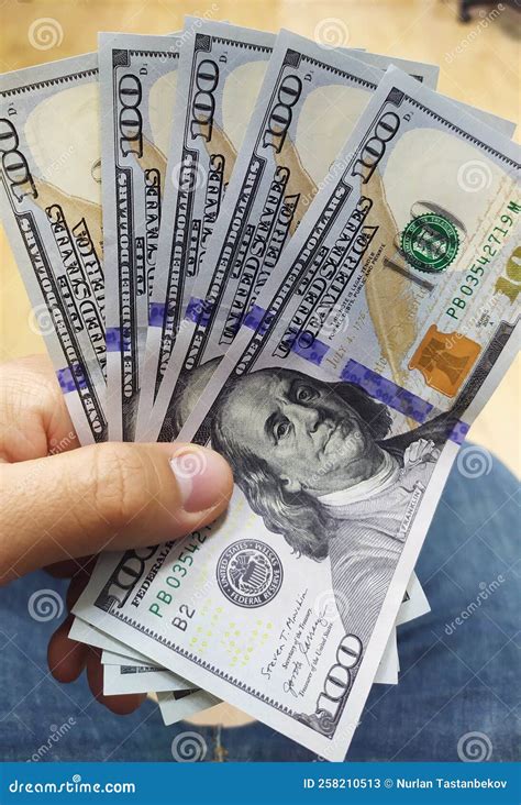 Holds Dollars in His Hand. 500 Dollars in Hand. Dollar Bills in Hand Stock Image - Image of cash ...