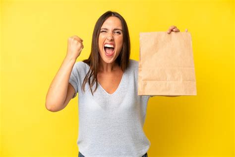 Shouting aggressively with an angry expression | Premium Photo