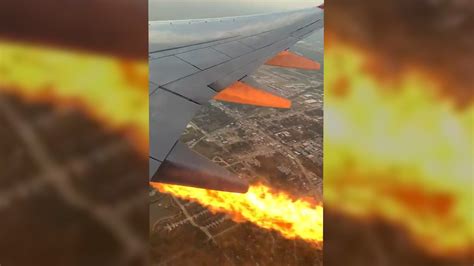 Watch: Passenger spots flames spitting from Southwest plane engine