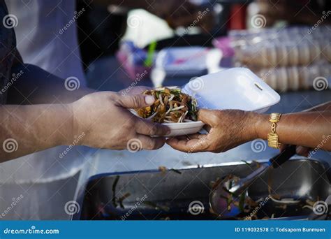 Rich People Give Food To the Poor. Starvation Concept Stock Photo ...