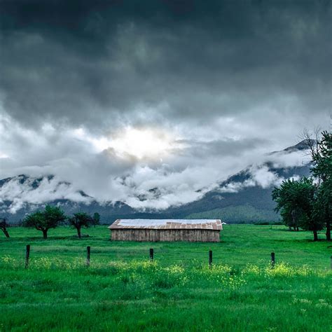 Download wallpaper 2780x2780 structure, grass, mountains, fog ipad air ...
