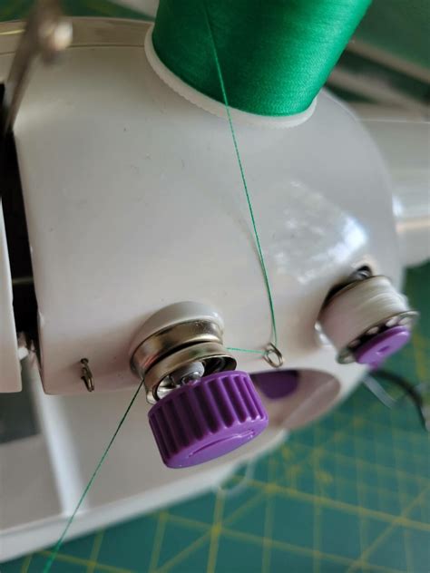 How to Thread a Small Sewing Machine 的图像结果