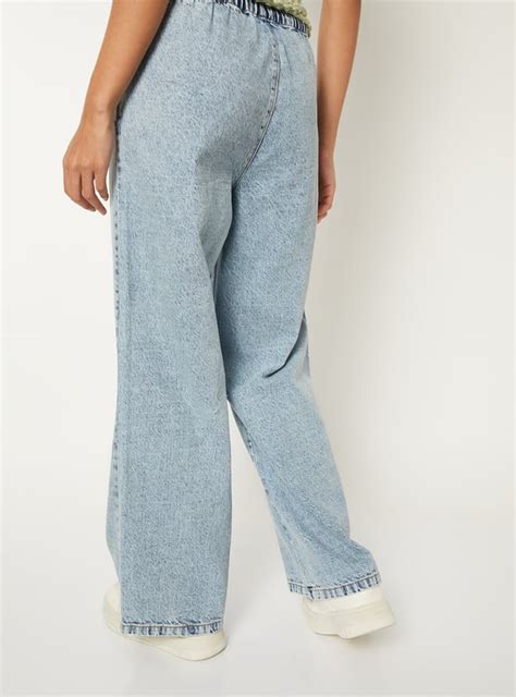 Buy Women Washed Wide Leg Jeans Online at just Rs. 1299.0 ...