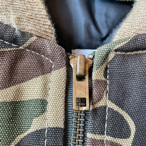 1987s Carhartt "duck hunter" camouflage quilting zip vest | What’z up