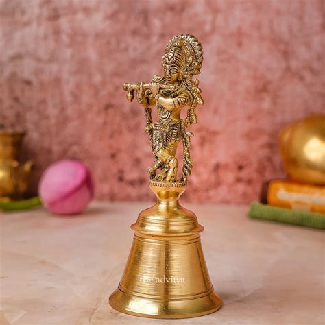The Advitya | Brass Krishna Bhagwan Murti on Bell