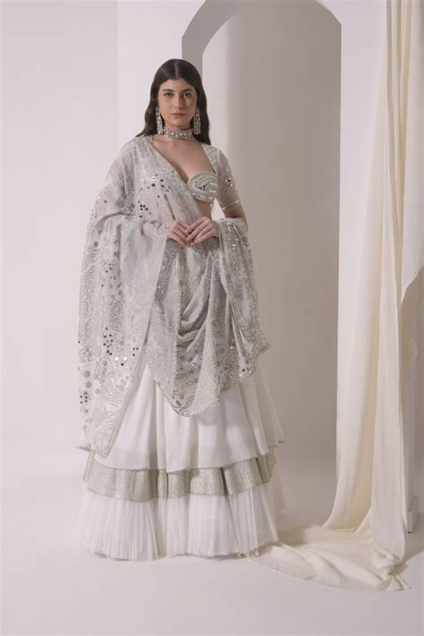 Circular tiered lehenga with embroidered blouse and foil dupatta ...